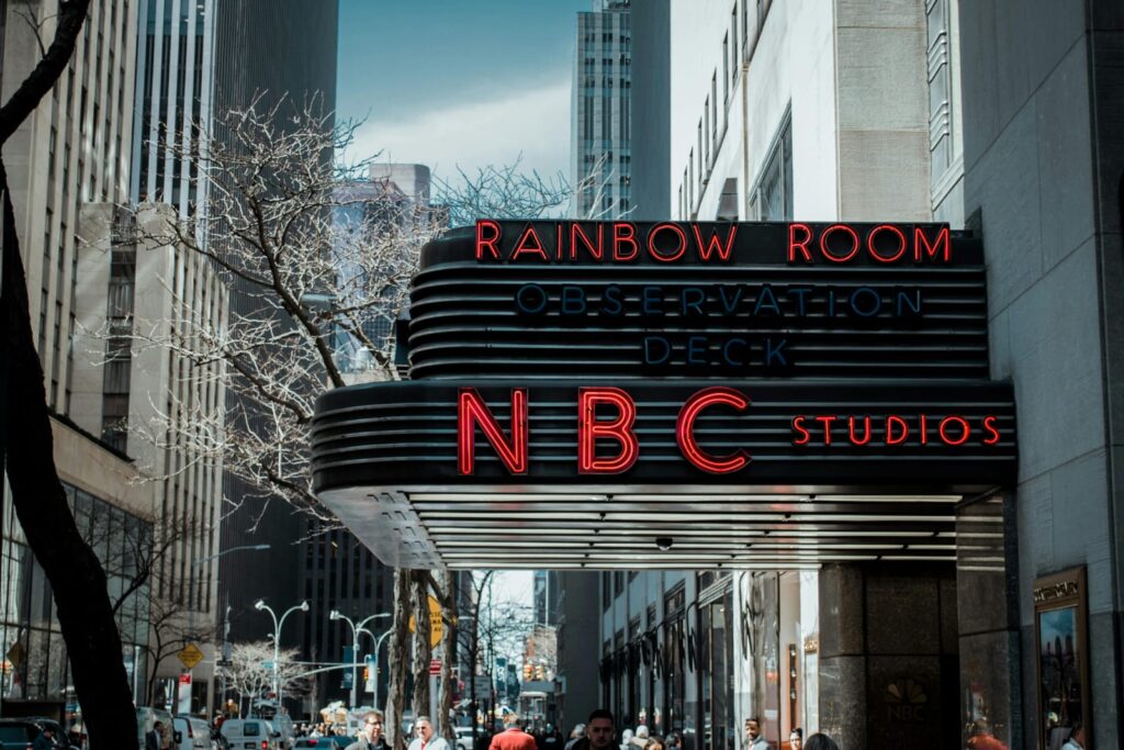 NBC Studios building at Rockefeller Center showing NBC News headquarters and its impact on US media and financial news coverage.