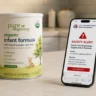 A smartphone showing safety alert data regarding the nara organics infant formula recall 2026 details.